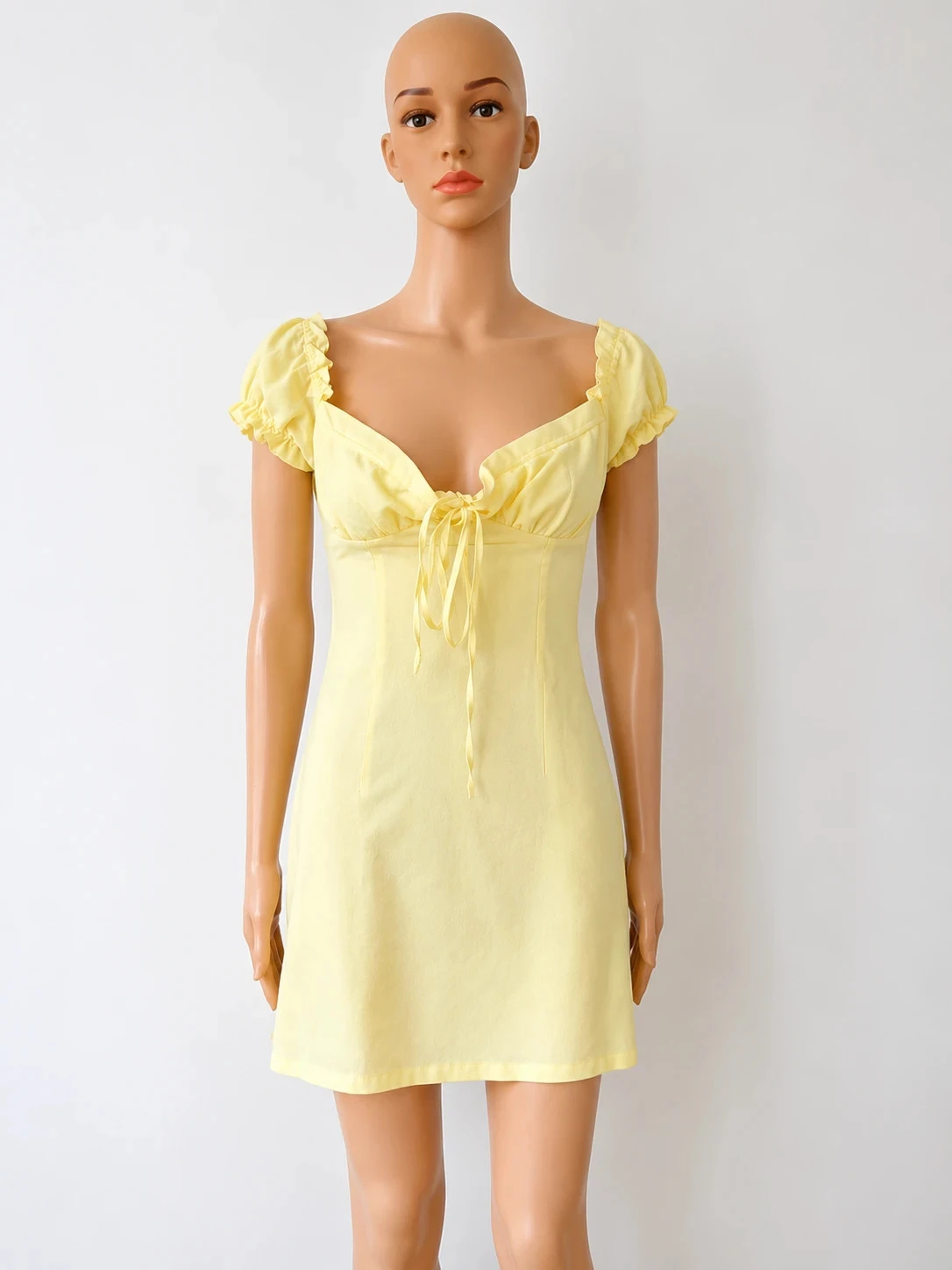 Robe jaune pastel Street T.34/XS – Style corset, manches bouffantes, mini robe romantique